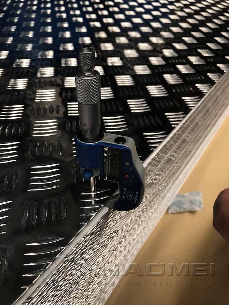 Raised aluminum tread plate for flooring